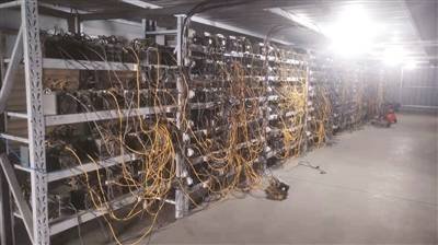 A vast cryptocurrency mining farm, showcasing rows of mining rigs and cooling systems.
