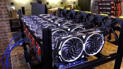 A large mining farm with rows of mining rigs