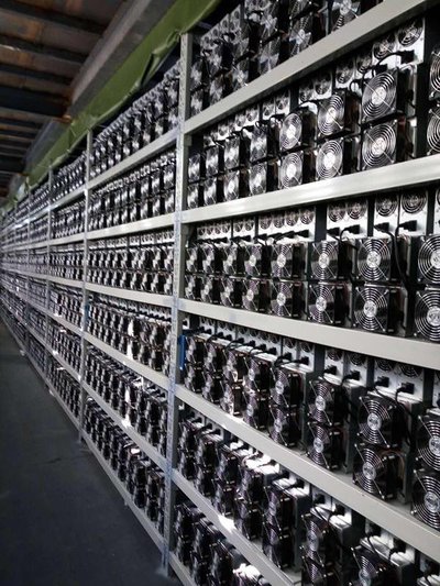 An intricate view of a high-performance mining rig in action, highlighting its components and role in efficient cryptocurrency extraction